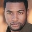 Kamal Angelo Bolden como Elgin Turner