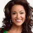 Katy Mixon como Betsy Faria