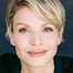 Kristin Lehman como Annie Flynn