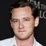 Lewis Pullman como Rhett Abbott