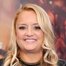 Lucy Davis como Eva Madden / Surge