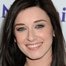 Margo Harshman como Mia