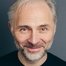 Mark Bonnar como Clive Timmons
