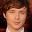 Marshall Allman como Milo Khoury