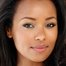 Melanie Liburd como Alexis Wright