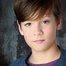 Michael Leone como Asian Kid (voice)