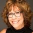 Mindy Sterling como Mrs. Stein