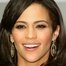 Paula Patton como Laura Price