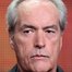 Powers Boothe como Cy Tolliver