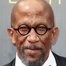 Reg E. Cathey como Norman Wilson