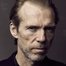 Richard Brake como Conrad Harlow