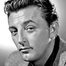 Robert Mitchum como Richard Dyson