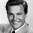 Robert Wagner como Cooper Main