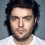Tom Burke como Cormoran Strike