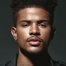 Trevor Jackson como Aaron Jackson