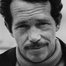 Warren Oates como Artie Krebs