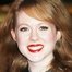 Zoe Boyle como Grace Emberly