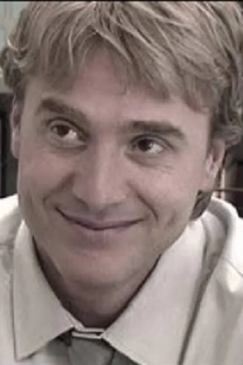 Anthony Natale interpretando a Dr. Gill, Teacher of the Deaf