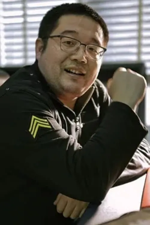 Foto de perfil del actor Che Zhi Gang en el reparto