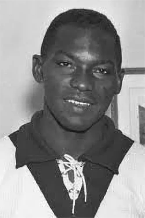 David Albritton interpretando a Self - High Jump, USA (uncredited)