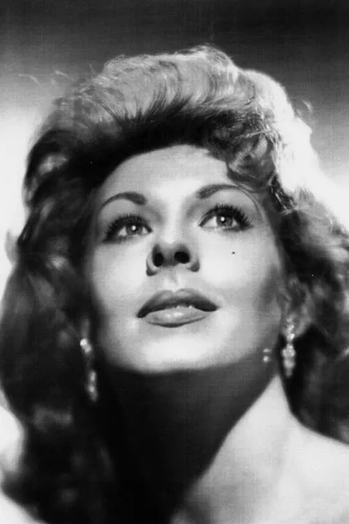 Dolly Sharp interpretando a Mrs. Olga Bradshaw / Joanna Moss (as Helen Wood)