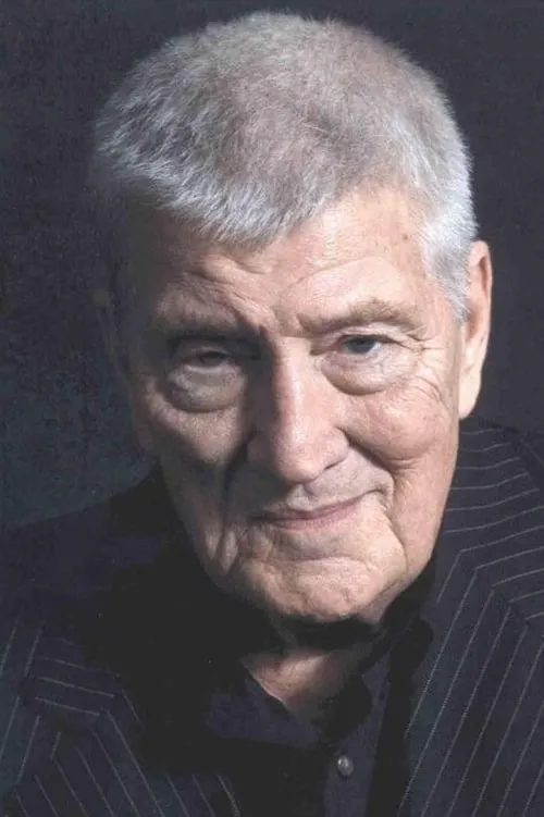 Doug Lennox interpretando a Mr. Hofstedter