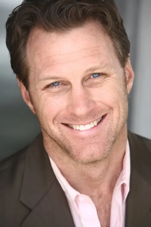 George Stumpf interpretando a Ken Rogers