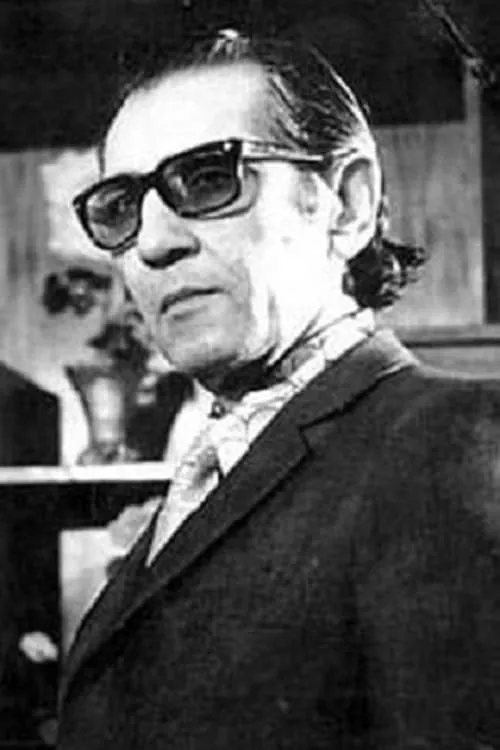 Jahangir Forouhar — personaje: Baqer Mirza / Head Waiter at Grand Hotel