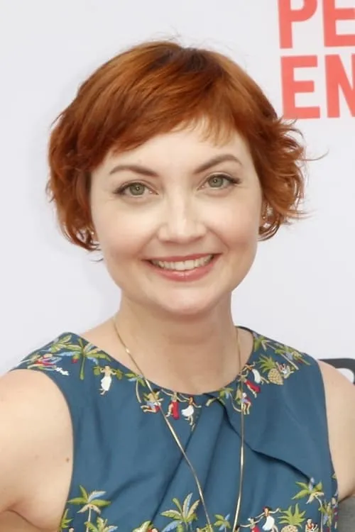 Jill E. Alexander interpretando a Caroline