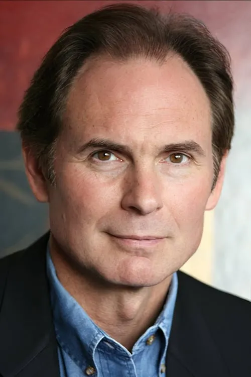 John Stuart West interpretando a Consciousness Expanding Manager