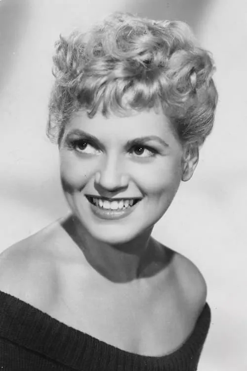 Judy Holliday interpretando a Laura Partridge