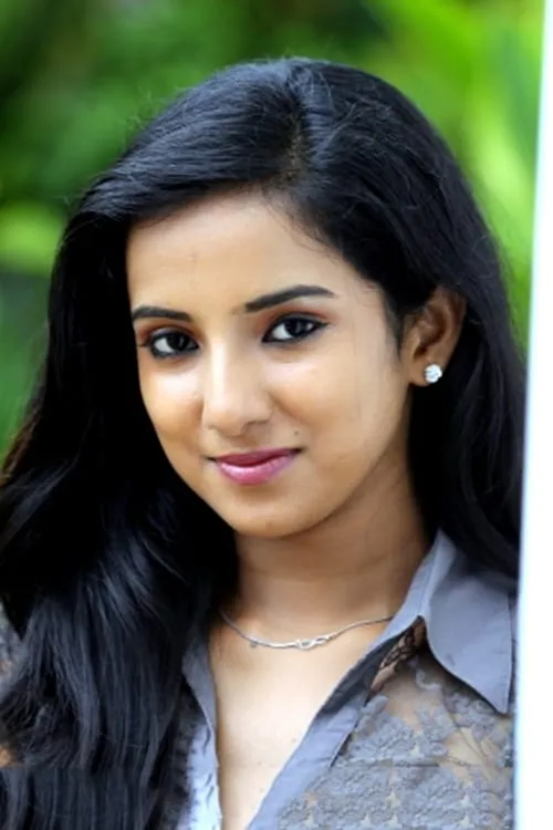 Leema Babu interpretando a Thulasi