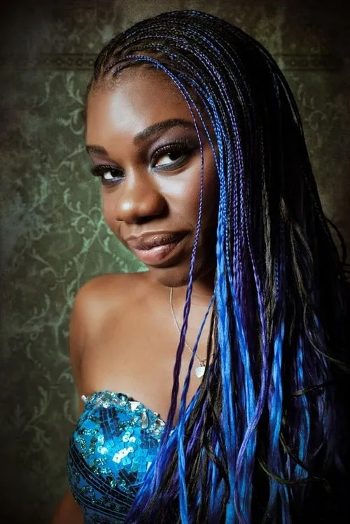 Me'sha Bryan interpretando a Suzanne / Mimi