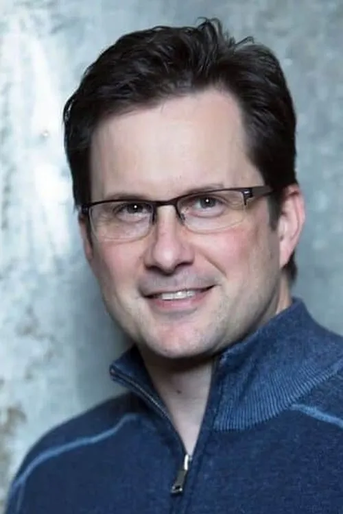 Michael Booth interpretando a