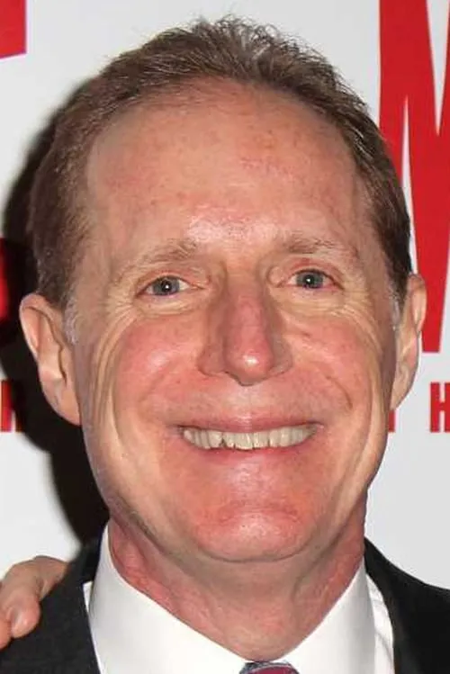 Michael Gore interpretando a