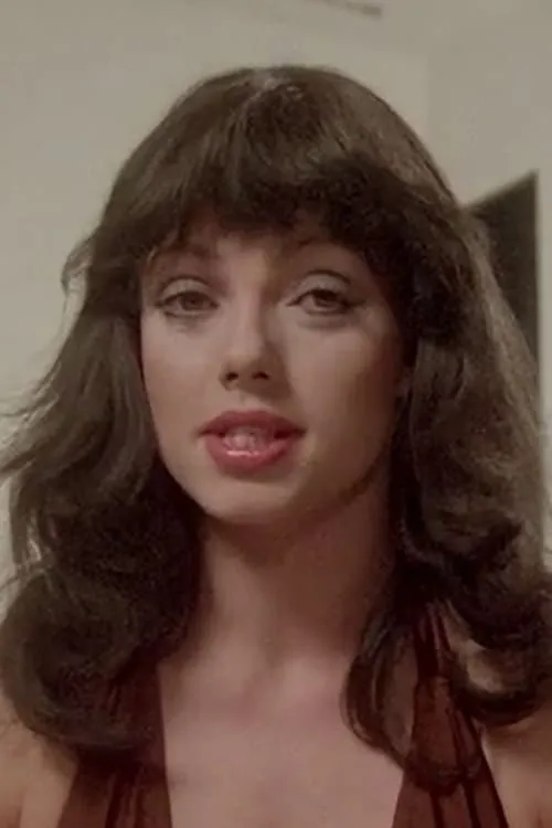 Monique Cardin interpretando a Mona McKenzie