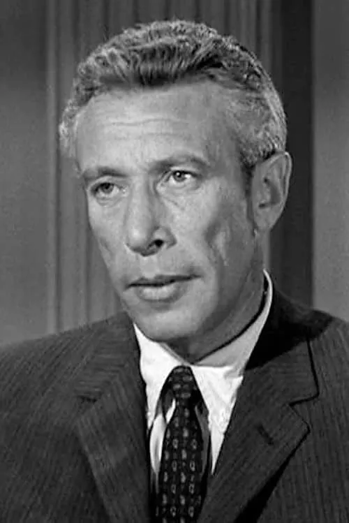 Mort Mills interpretando a Al Schwartz - District Attorney's Assistant