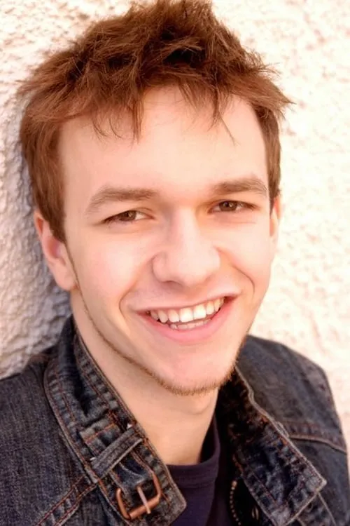 Nick May interpretando a Truman Blake