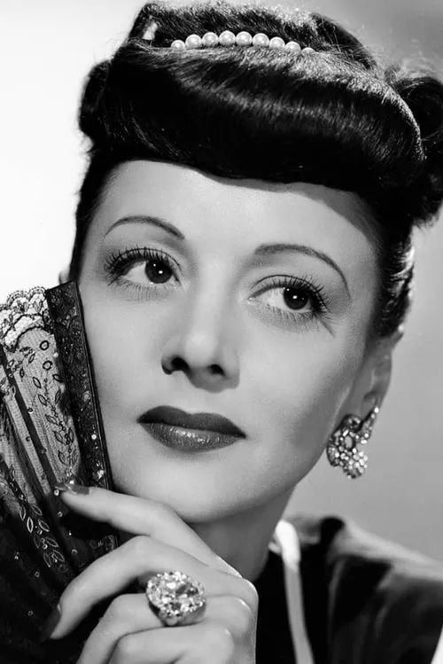 Nina Vale interpretando a Joan Hill, Gale's Secretary