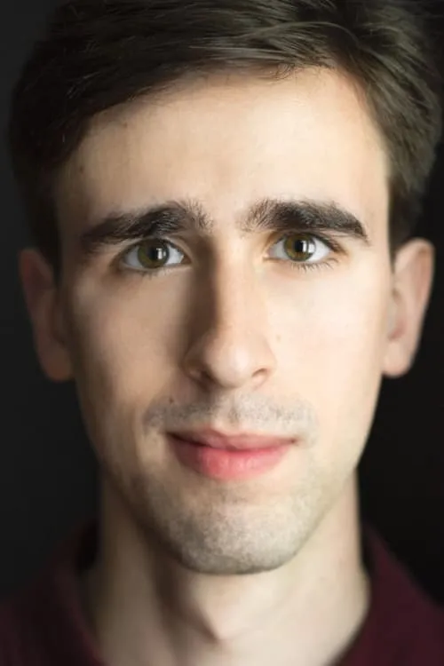 Philip J. Macaluso interpretando a Zack