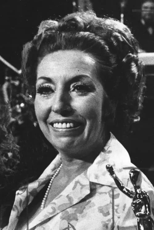 Rita Bibeau interpretando a Mme. Meloche