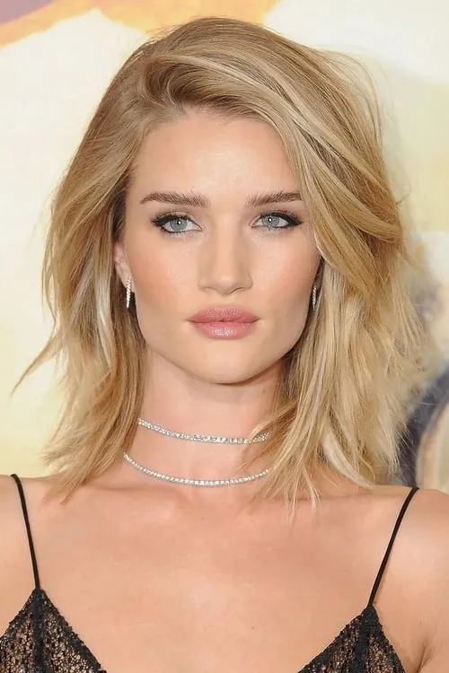 Rosie Huntington-Whiteley interpretando a Carly Spencer