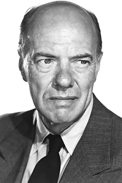 Russell Collins interpretando a 