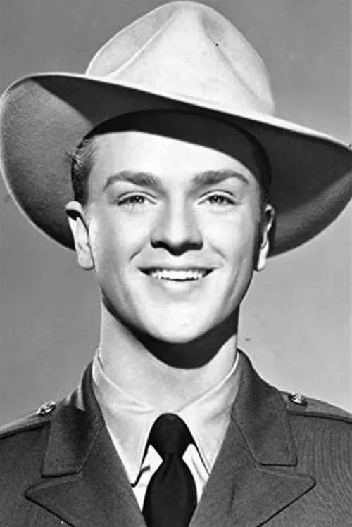 Scott Elliott interpretando a Andrews / Bryan / Merkle / Sands