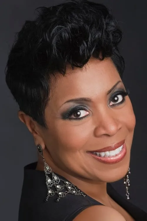 Shirley Strawberry interpretando a Laura Helms