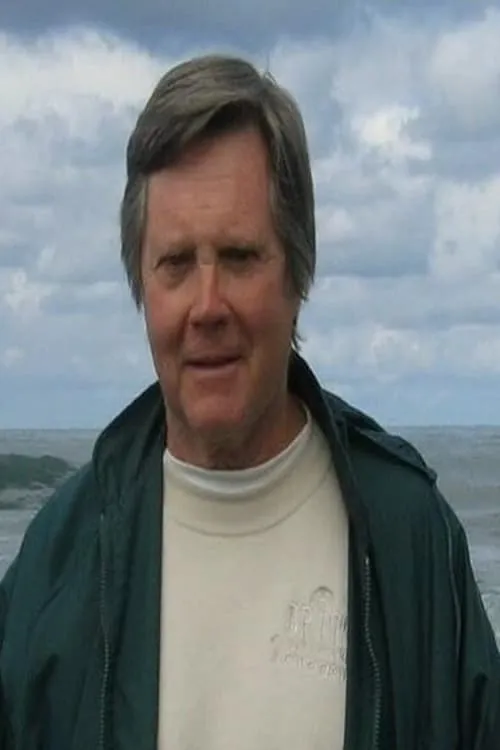 Steve Carlson interpretando a Robert Drummond