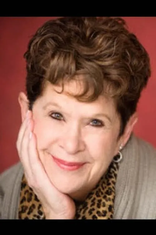 Susan Baer Collins interpretando a Museum Lecturer