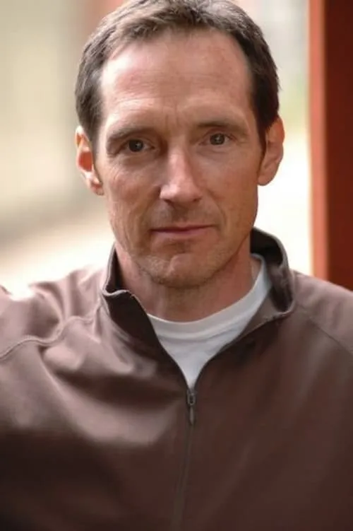 Taylor Nichols interpretando a Ted Sorensen