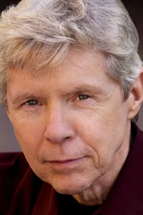 Tuck Milligan interpretando a Muncie Logan