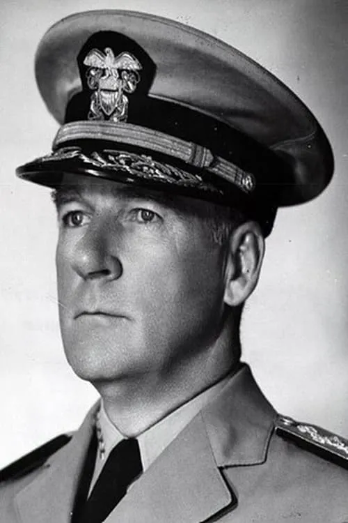 W.H.P. Blandy interpretando a Self - Commander Joint Task Force One (archive footage)